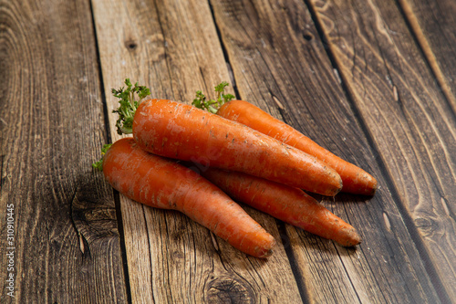 Red carrots on a wooden background.Vegetables.
