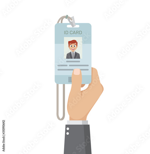 Hand holding the id card.
