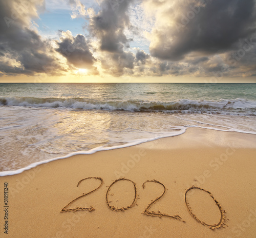 2020 year on the sea shore during sunset