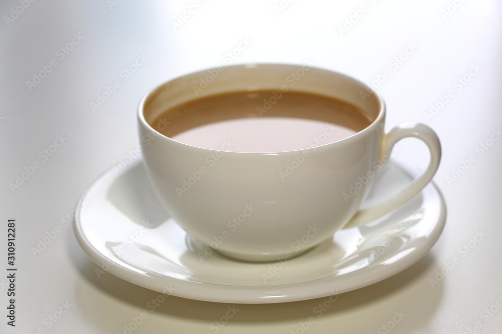 Coffee with milk. White cup. Soft brie cheese. Morning. Tasty breakfast. Coffee with milk. White cup. Soft brie cheese. Morning. Tasty breakfast.