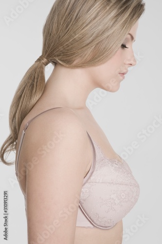 Profile Of Young Woman In Bra