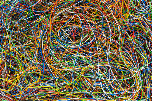 Network Chaos Of Colorful Electrical and Telecommunication Cables as Background photo