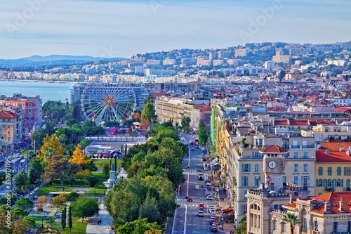 Colorful aerial panoramic view over the old town of Nice, France, with the famous Massena square and the Promenade du Paillon, from the roof of Saint Francis tower