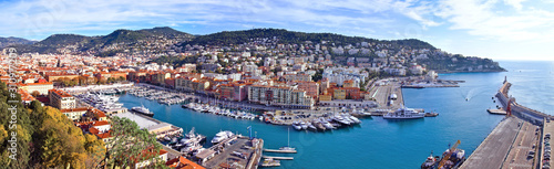 Nice, France - December 1, 2019: Panoramic aerial view over the Lympia port of Nice, France, on a clear winter morning, with Mount Boron hill on background