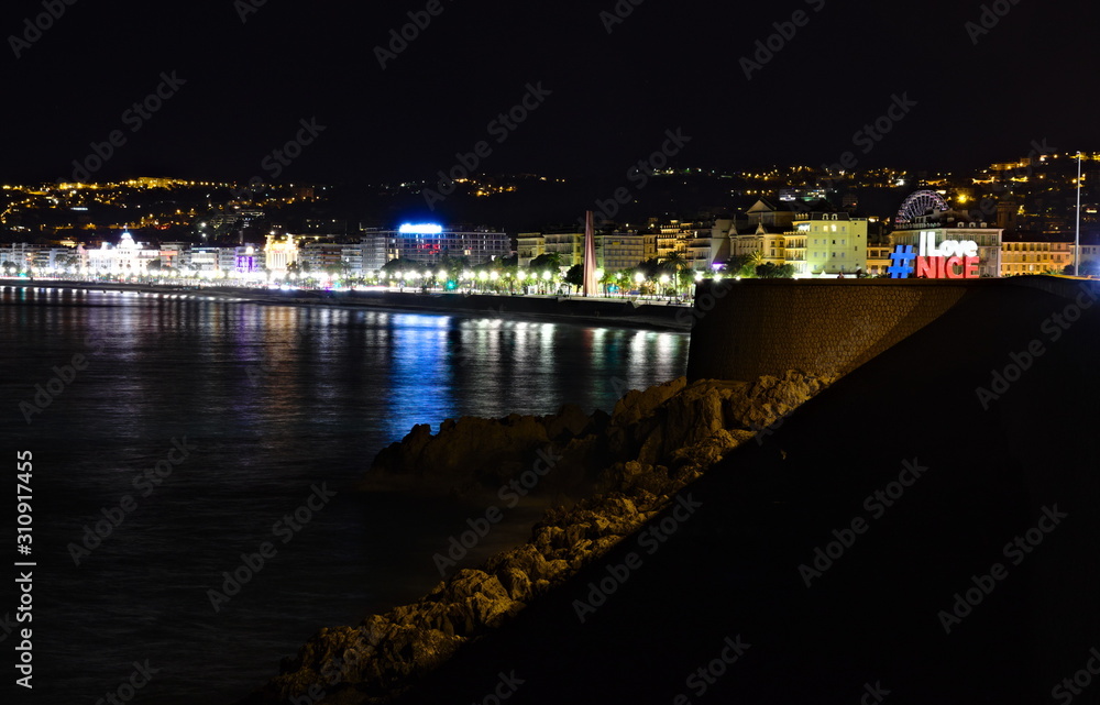 Nice, France - December 2, 2019: night panoramic view on the Promenade Des Anglais, famous luxury waterfront on the Mediterranean Sea