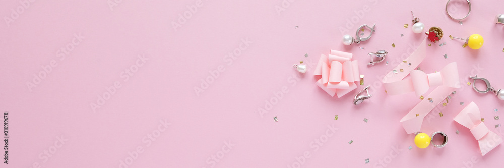 Female accessories on pink background. Female concept
