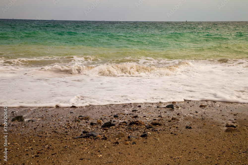 the wave rolling on the sand the wave rolling on the sand