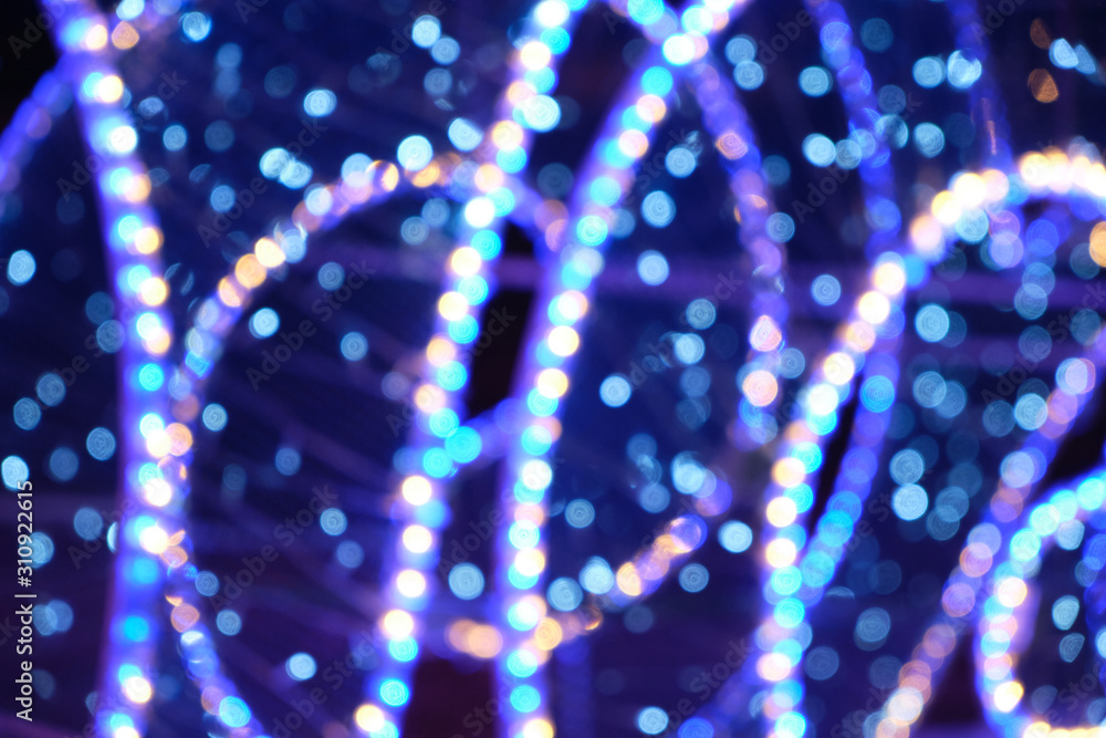 Abstract Christmas background, bokeh of colorful garlands. Abstract Christmas background, bokeh of colorful garlands.