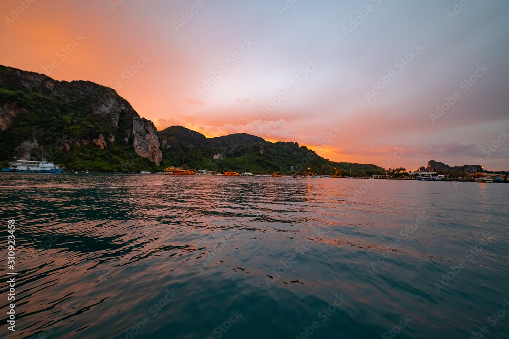 Stunning Golden Hour Sea Scape at Phi Phi Islands in Andaman Sea, Thailand. selective focus