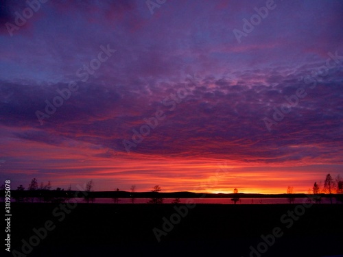 Sunrise at ultraviolet sky in the North