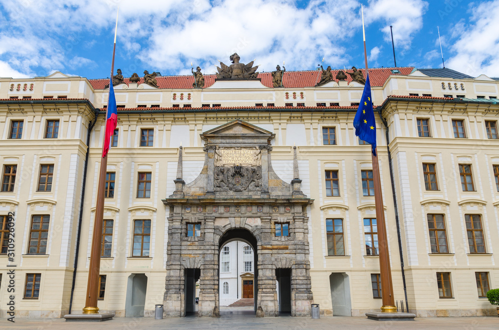 Fototapeta premium Matthias Gate of New Royal Palace (Novy kralovsky palac) and EU and Czech flags at flagpole in Prague Castle Hradcany, Lesser Town Mala Strana district, Bohemia, Czech Republic