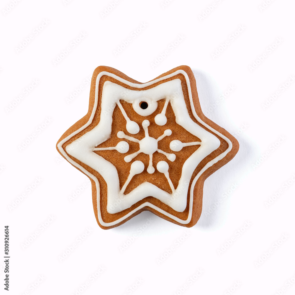 Decorated gingerbread star isolated on white background Decorated gingerbread star isolated on white background