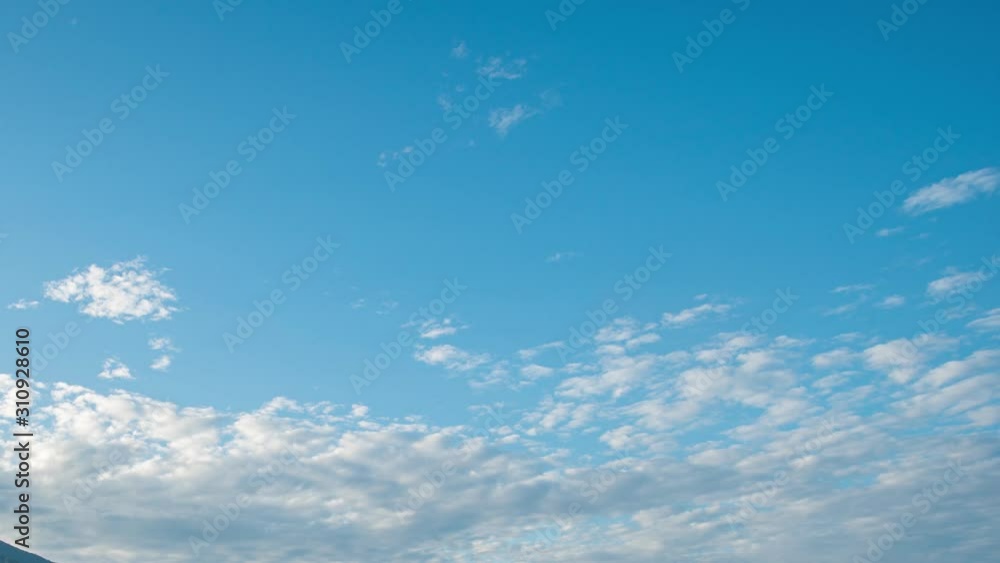 Timelapse The Motion and deformation of clouds Althoqumulus, bright blue sky Timelapse The Motion and deformation of clouds Althoqumulus, bright blue sky