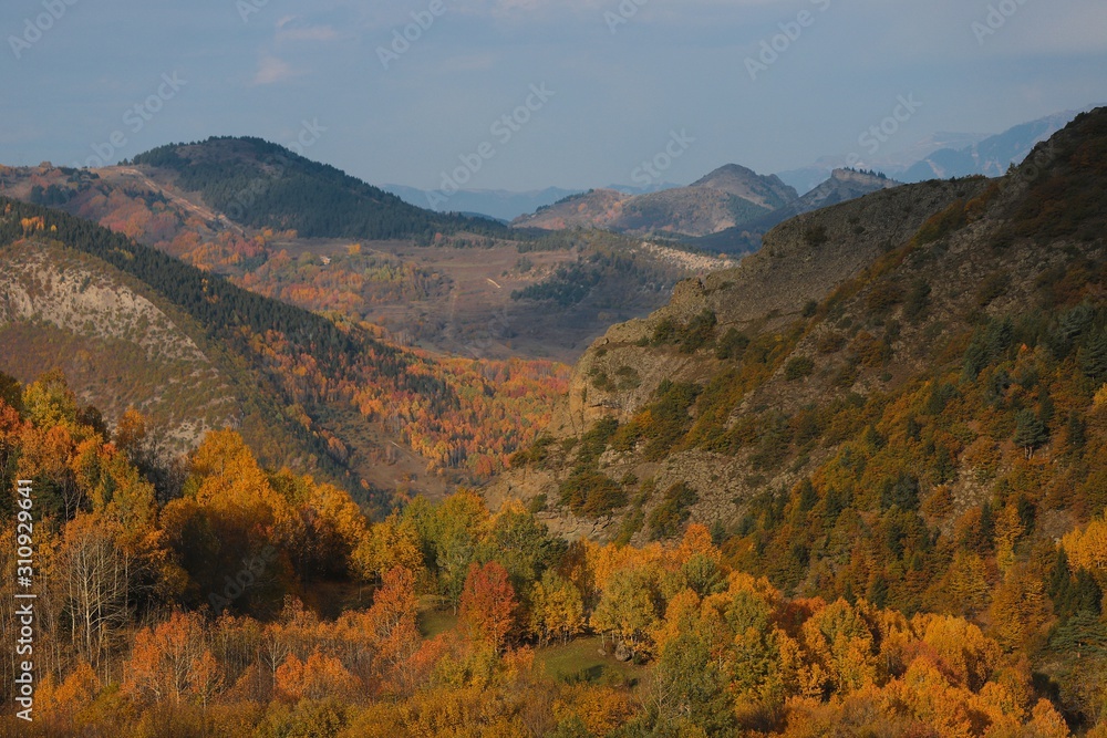 Colorful autumn landscape in the mountain village. 