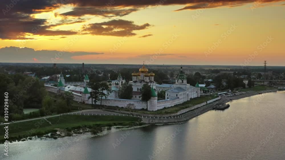 Aerial around view of famous Ipatievsky (Hypatian) Monastery in ancient touristic town Kostroma at sunset, Russia, 4k Aerial around view of famous Ipatievsky (Hypatian) Monastery in ancient touristic town Kostroma at sunset, Russia, 4k