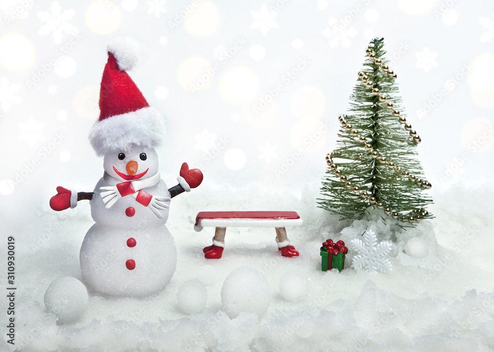 Cheerful snowman next to the tree and bench. Creative collage.