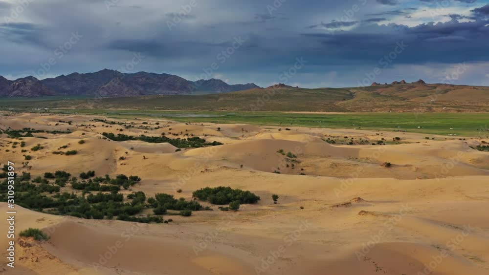 Aerial view of the sand dunes Elsen Tasarhai (Bayan Gobi) at sunset in Mongolia, 4k Aerial view of the sand dunes Elsen Tasarhai (Bayan Gobi) at sunset in Mongolia, 4k
