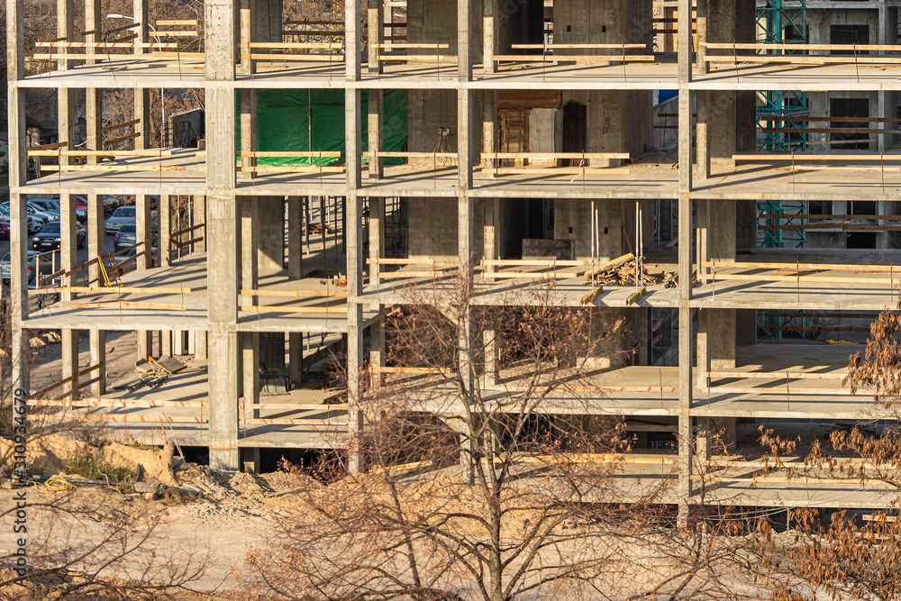 Construction of a multi-storey building. Unfinished large building. Construction of a multi-storey building. Unfinished large building.