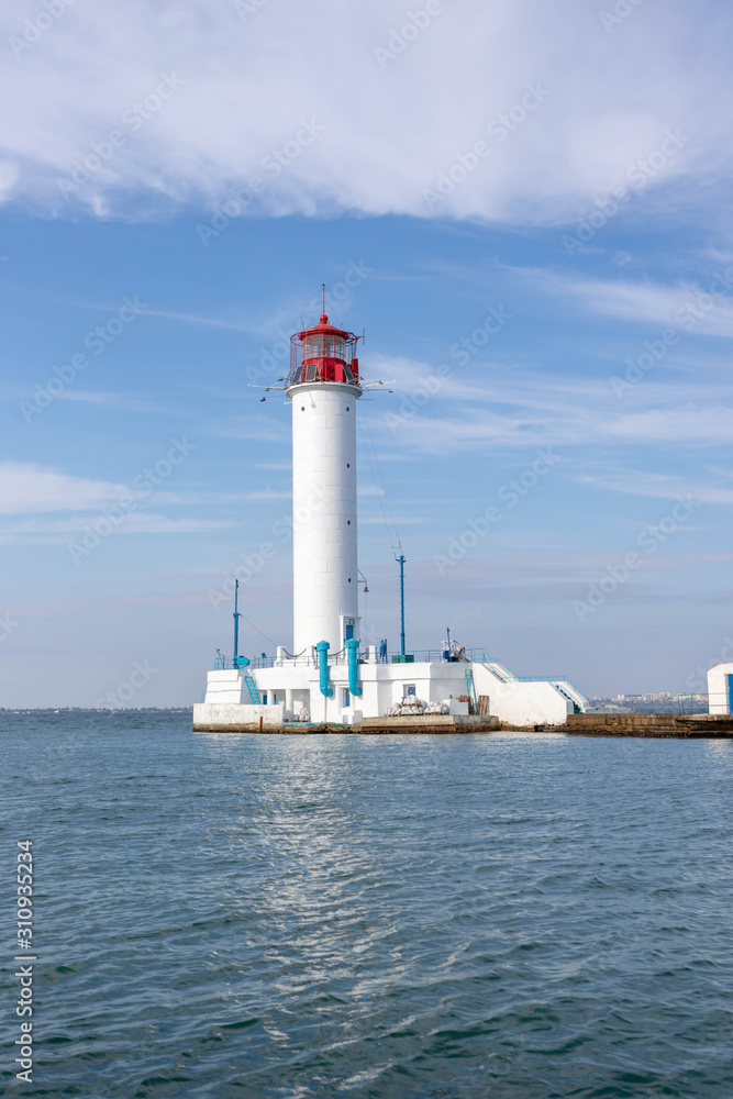 Lighthouse at sea. Light for sailors