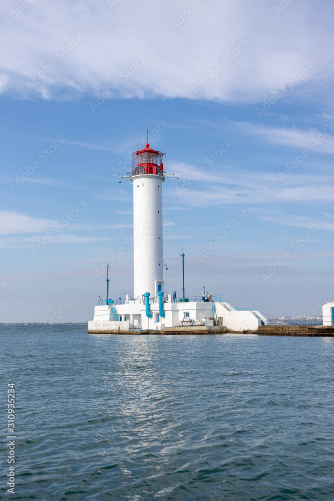 Lighthouse at sea. Light for sailors Lighthouse at sea. Light for sailors