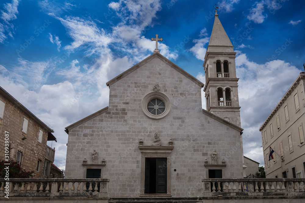 Supetar, Croatia / June 27th 2018: Church of Saint Peter, sveti Petar in old town Supetar, Brac Island. Croatia, Europe