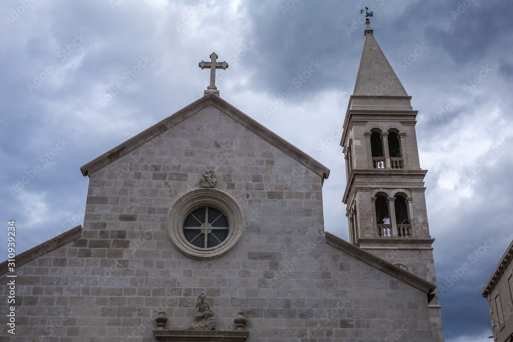 Supetar, Croatia / June 27th 2018: Church of Saint Peter, sveti Petar in old town Supetar, Brac Island. Croatia, Europe