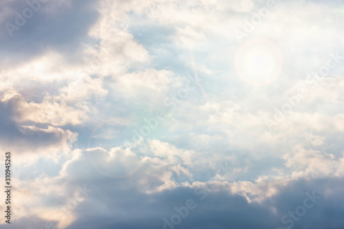 blue clouds on the sky in the rays of the sun in the fall. Landscape background texture, copy space