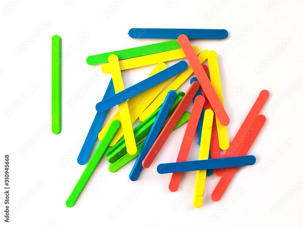 Close-up of sticks for teaching children to count. Counting sticks, educational toys, teaching children. Application in the catalogs of children's stores, promotional products, education. Close-up of sticks for teaching children to count. Counting sticks, educational toys, teaching children. Application in the catalogs of children's stores, promotional products, education.