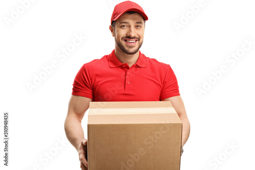 Young man delivering a cardboard box © Ljupco Smokovski