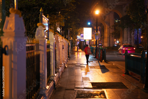 Bangkok,Thailand-December 8, 2019: Ratchadamri Street along Phra Phrom or Erawan Shrine before the dawn in Bangkok photo