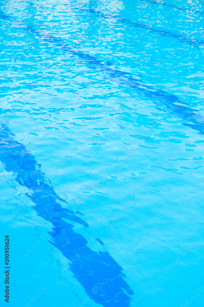 Blue water and laens in swimming pool