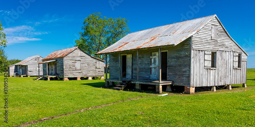 APRIL 27, 2019 - LOUISIANA, USA - Old Slave Cabins on St. Joseph Plantation, Vacherie, Louisiana photo