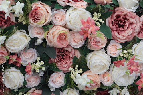 Colorful beauty pink and white roses backdrop for Valentines day wedding concept background texture