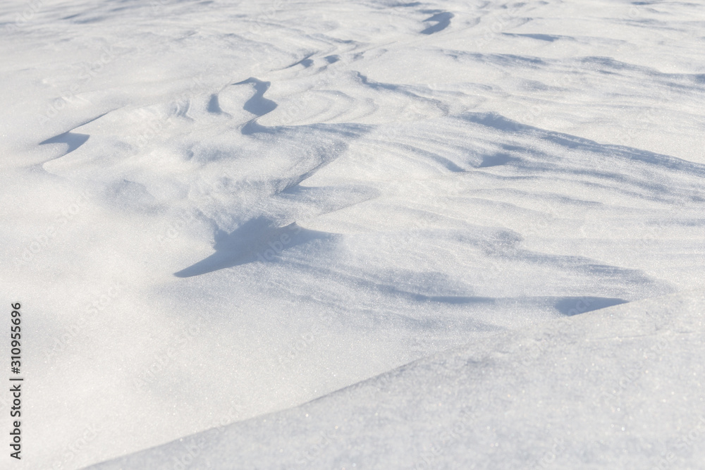 Background of smooth surface of snow, snow waves Background of smooth surface of snow, snow waves