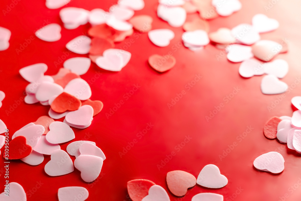 Valentine day concept. Soap red and pink Hearts with red background. 