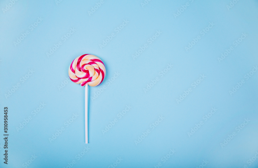 Colorful lollipop on blue Colorful lollipop on blue