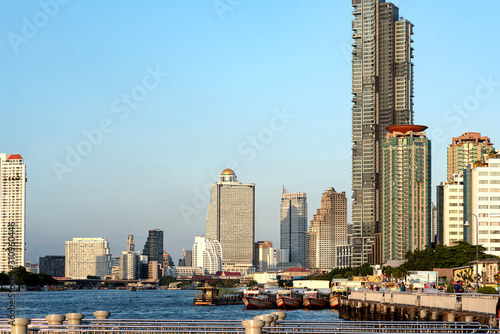 Horizontal shot of Bangkok cityscape. Bangkok evening view on the river in the business district. Modern buildings  tourism in Thailand  Asia concept