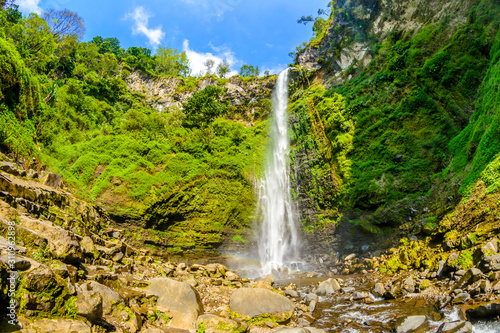 Lnadscape view of Coban Rondo waterfall in Pujon, Malang, East Java, Indonesia © MonicaPriscilla