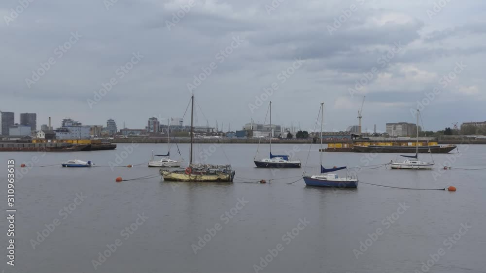 Boats and ships on a city river. Boats and ships on a city river.