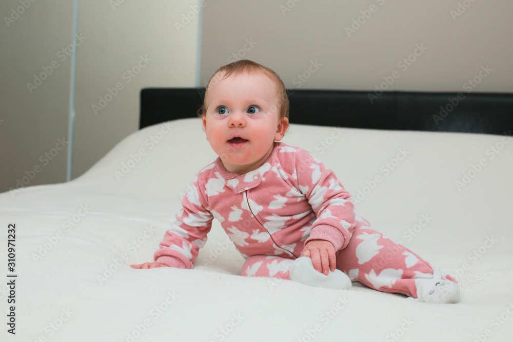 Close up Portrait of Cute Little 9 Month Old Baby Girl , with sticker Close up Portrait of Cute Little 9 Month Old Baby Girl , with sticker