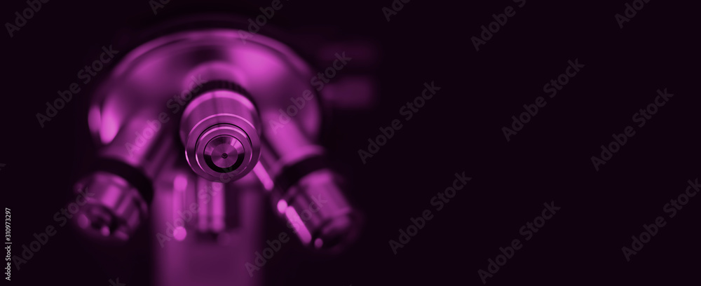 Microscope in purple tone. Optical microscope - science and laboratory equipment. Microscope in purple tone. Optical microscope - science and laboratory equipment.