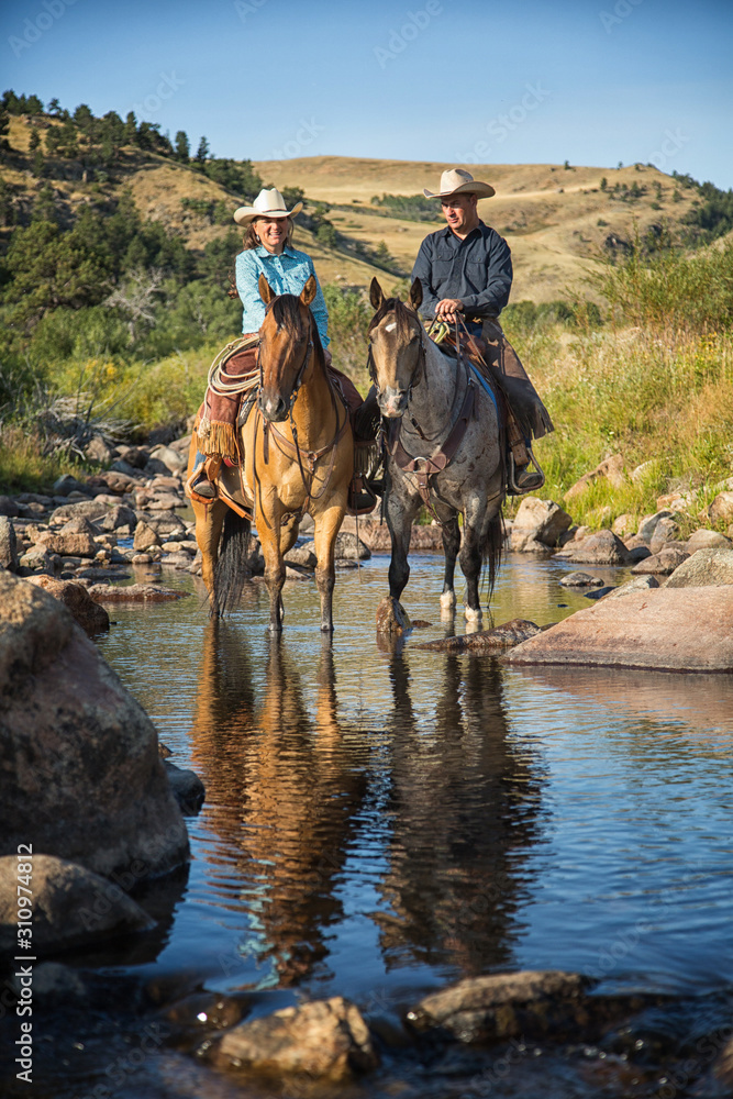 Naklejka premium Cowboy and Cowgirl