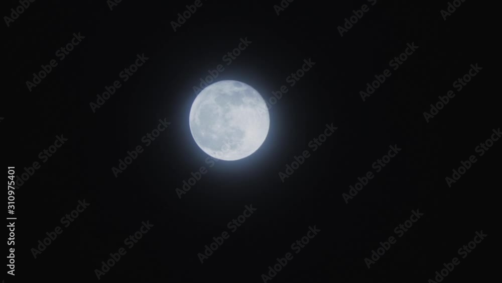 Bright full moon on the night sky. Moon surface. Natural satellite. Bright full moon on the night sky. Moon surface. Natural satellite.