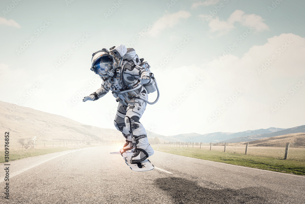 Spaceman on flying board. Mixed media Spaceman on flying board. Mixed media