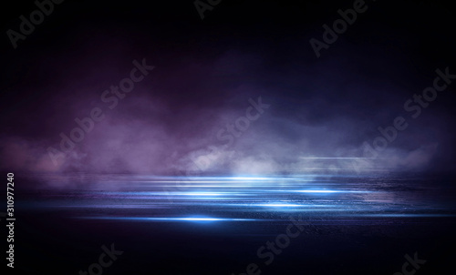 Empty background scene. Dark street reflection on the wet pavement. Rays neon light in the dark  neon figures  smoke. Night view of the street  the city. Abstract dark background. Abstract spotlight. 