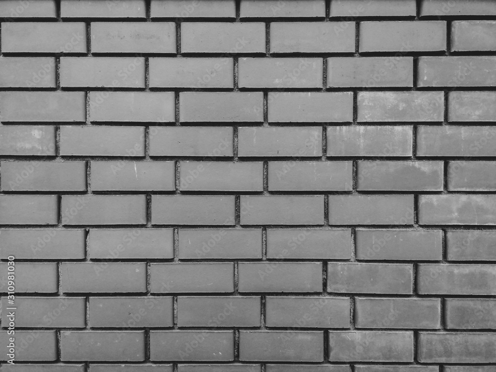 Bricks on a black and white wall Bricks on a black and white wall