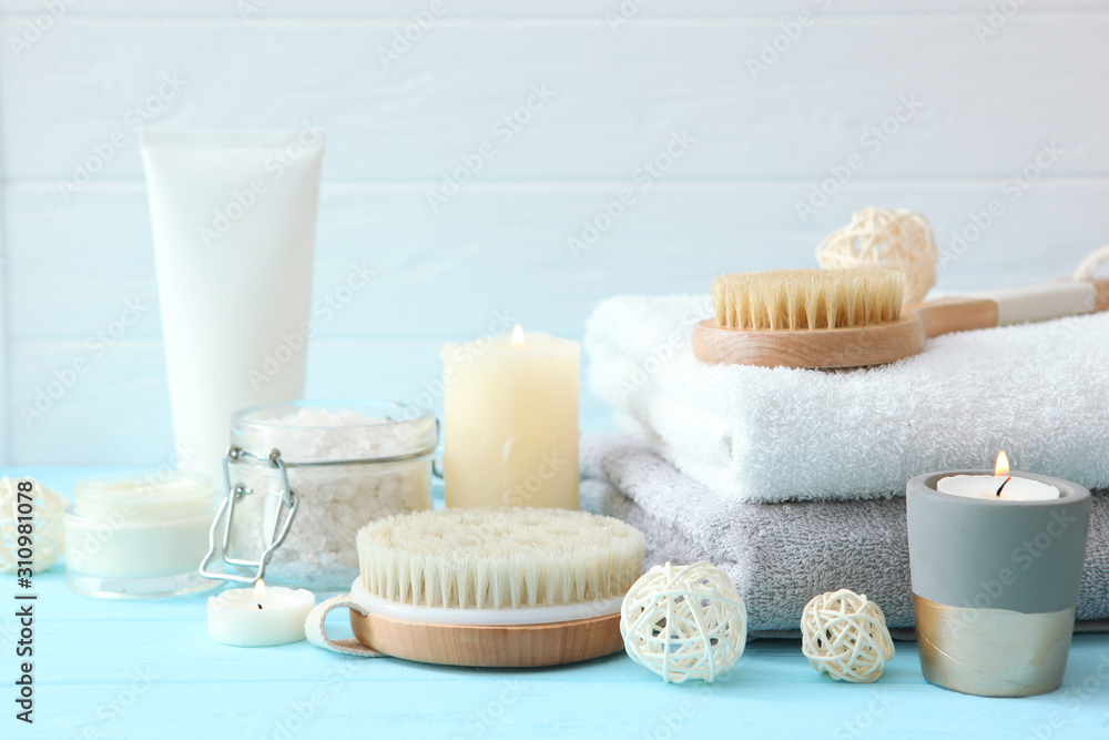 spa composition with towels and care products on the table with place for text. Body care, relaxation
