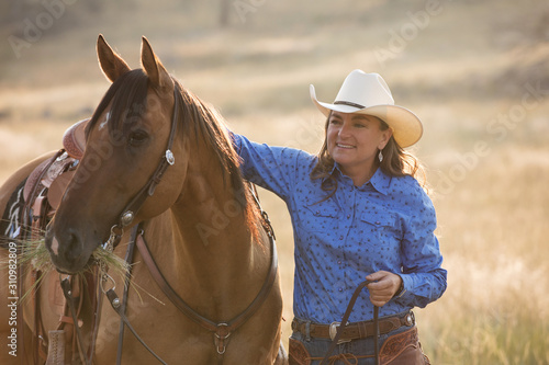 Cowgirl With Horse