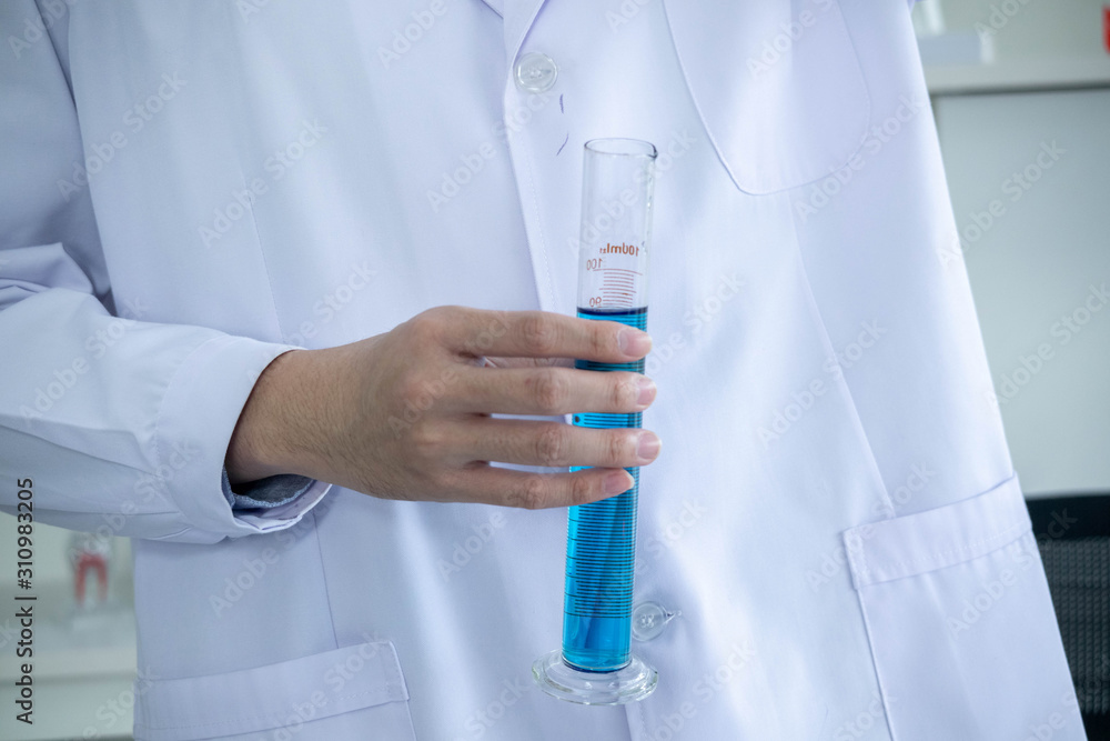 Fototapeta premium The concept of medical, chemicals or scientific laboratory research and Innovation in the laboratory. experienced man scientist is performing work in the laboratory..