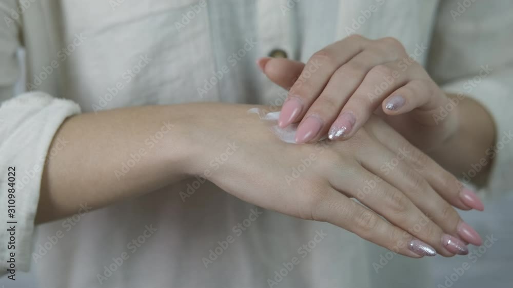Woman with cream for hands care. Woman with cream for hands care.